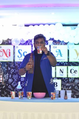 science performer on stage in birthday party event